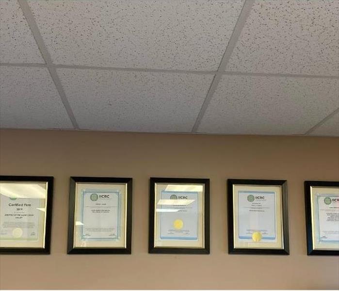 Row Of Framed Certificates
